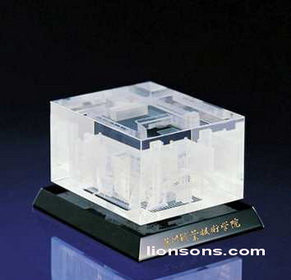 3d laser etched crystal with building design inside the top block, and fixed with a rotated engraved black crystal base.